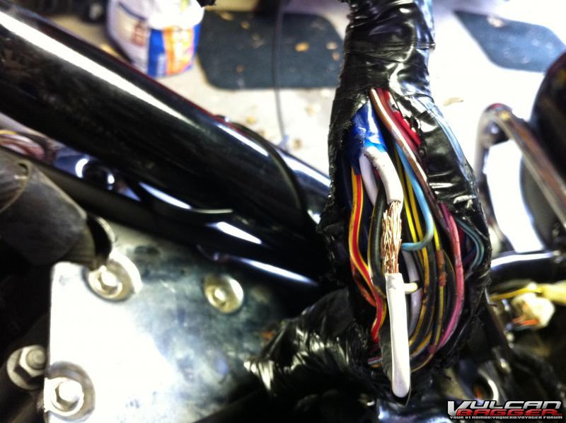 This is the cause of the main fuse blowing. The wiring harness was rubbing on the rocker cover.